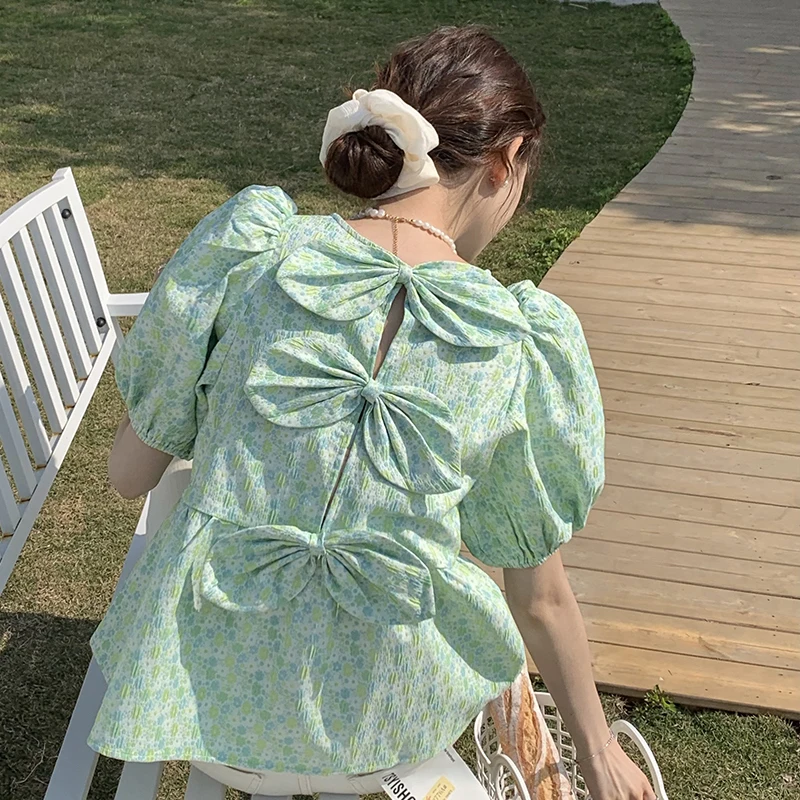 Floral Shirt Women's Niche Summer French O-neck Back Bow Loose Puff Sleeves Small Fresh and Sweet Comfortable top
Floral Shirt Women's Niche Summer French O-neck Back Bow Loose Puff Sleeves Small Fresh and Sweet Comfortable top
