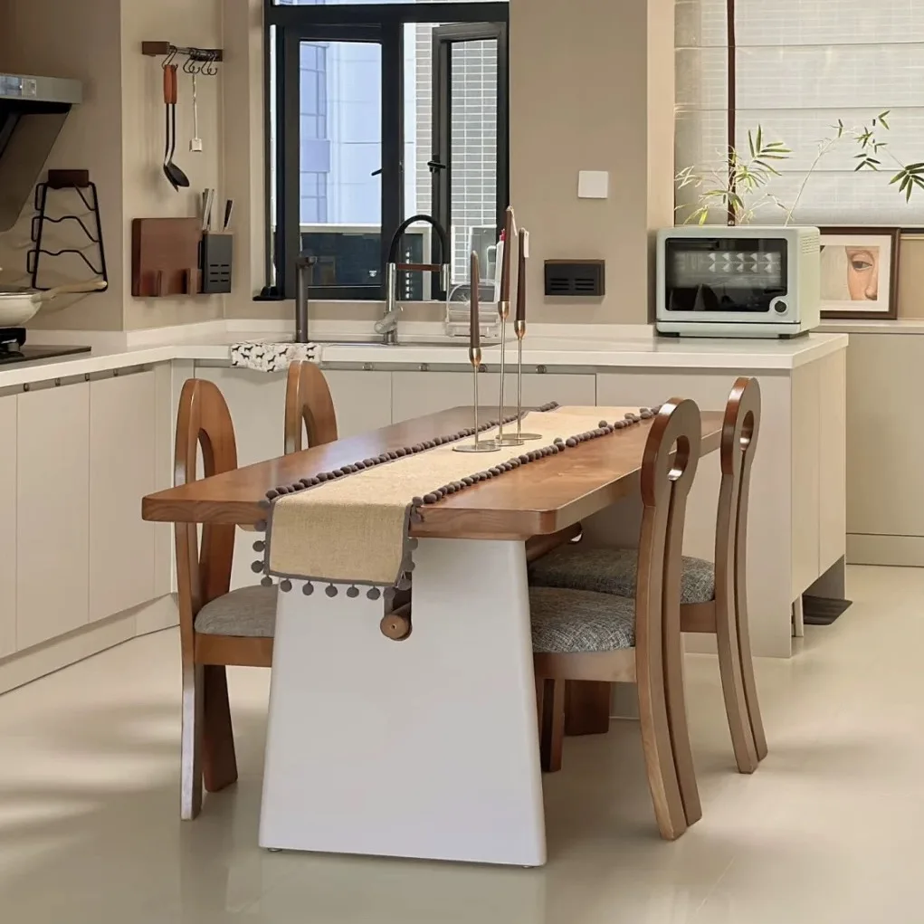 Medieval wabi style solid wood dining table simple modern designer desk desk Nordic retro style long table
Medieval wabi style solid wood dining table simple modern designer desk desk Nordic retro style long table