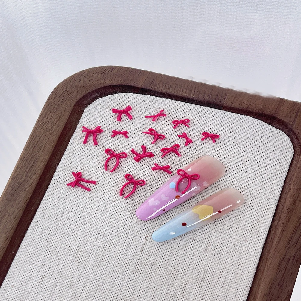 50Pcs/Bag French Gentle Style Simple Rose Red Bow Nail Charms Art Decorations Mixed Pack Streamer Bow DIY Accessories
50Pcs/Bag French Gentle Style Simple Rose Red Bow Nail Charms Art Decorations Mixed Pack Streamer Bow DIY Accessories