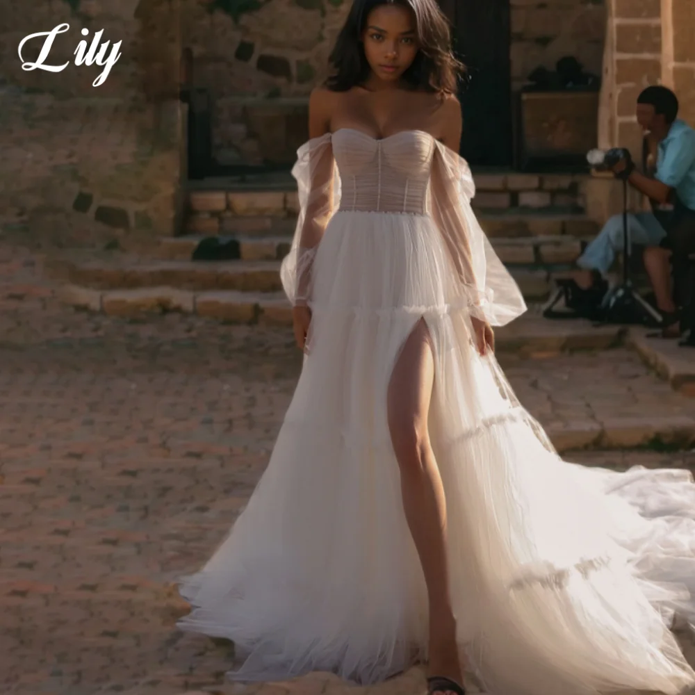 Элегантные свадебные платья Lily Sweetheart с рукавами три четверти и открытой спиной, свадебное платье трапециевидной формы с разрезом по бокам, свадебное платье по индивидуальному заказу
Элегантные свадебные платья Lily Sweetheart с рукавами три четверти и открытой спиной, свадебное платье трапециевидной формы с разрезом по бокам, свадебное платье по индивидуальному заказу