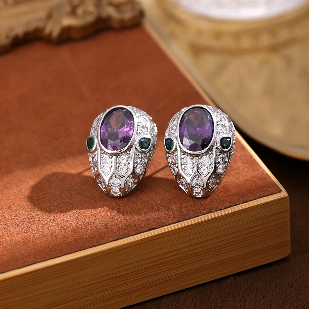 Imitation natural amethyst spirit snake pendant European and American luxury purple diamond color snake earrings
Imitation natural amethyst spirit snake pendant European and American luxury purple diamond color snake earrings
