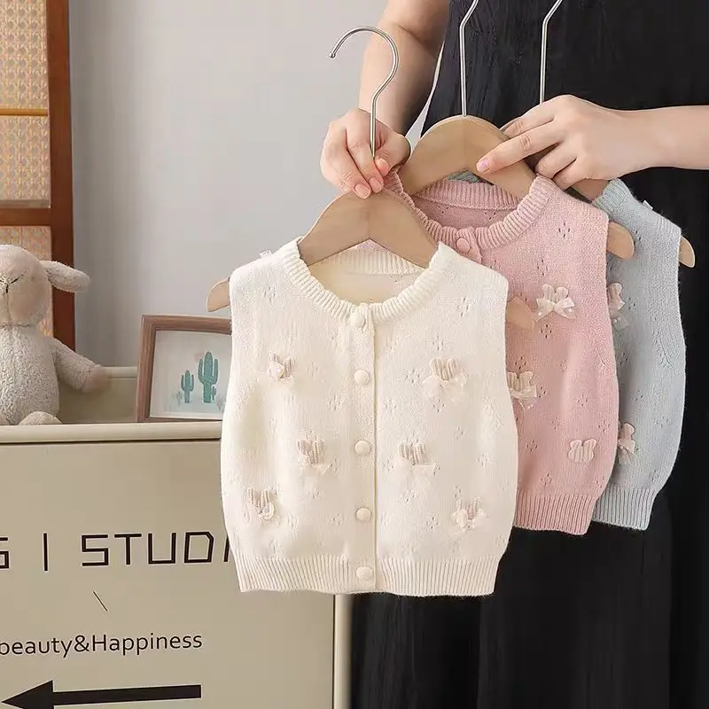 2026 New Autumn And Winter Girls Cute Little Bow Cardigan Shoulder Children's Sweater Vest With Hollowed-out Knitted Waistcoat
2026 New Autumn And Winter Girls Cute Little Bow Cardigan Shoulder Children's Sweater Vest With Hollowed-out Knitted Waistcoat