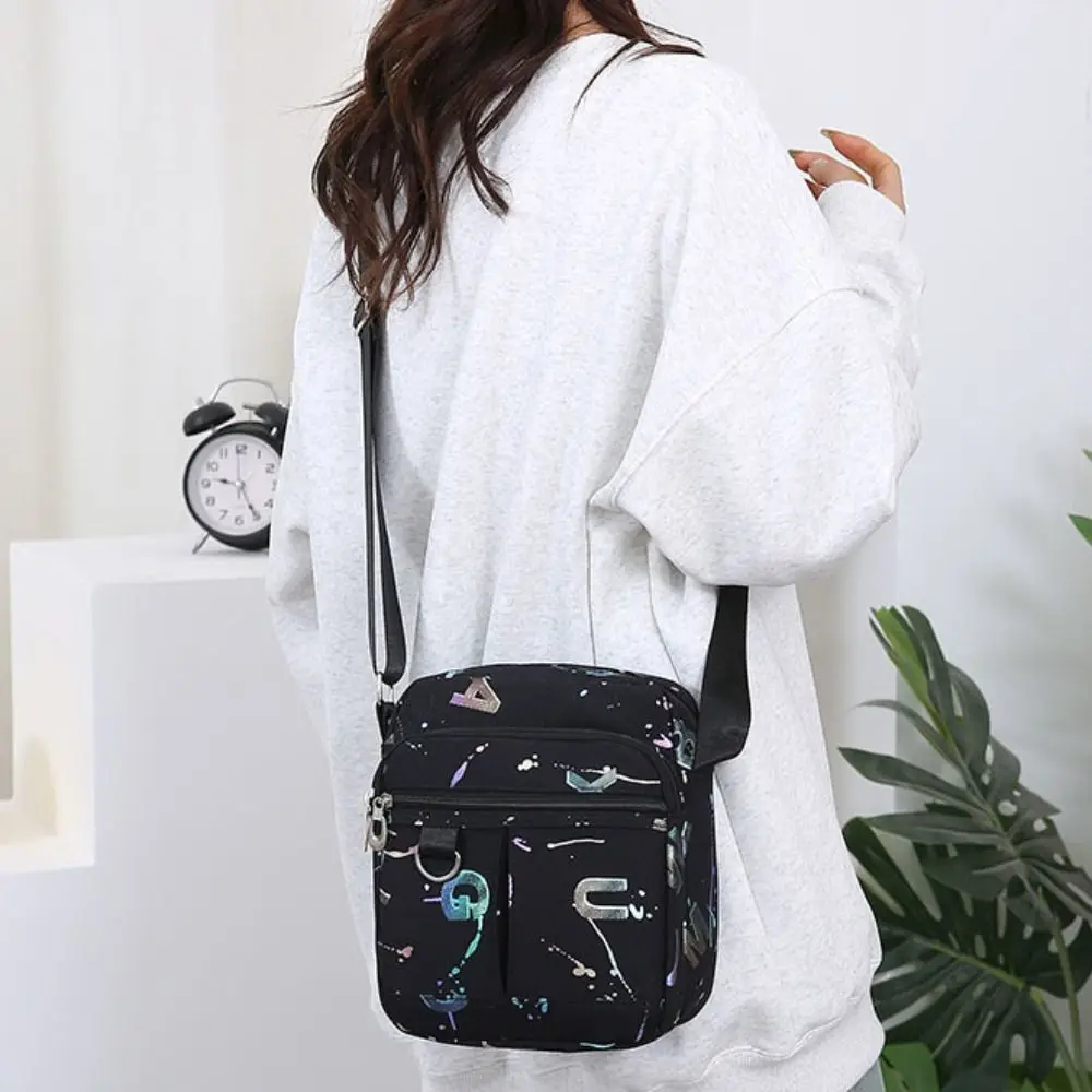 Multi-layer Multi Pocket Nylon Shoulder Bag Printing Lightweight Middle Aged Tote Bag Leisure Waterproof Casual Crossbody Bag
Multi-layer Multi Pocket Nylon Shoulder Bag Printing Lightweight Middle Aged Tote Bag Leisure Waterproof Casual Crossbody Bag