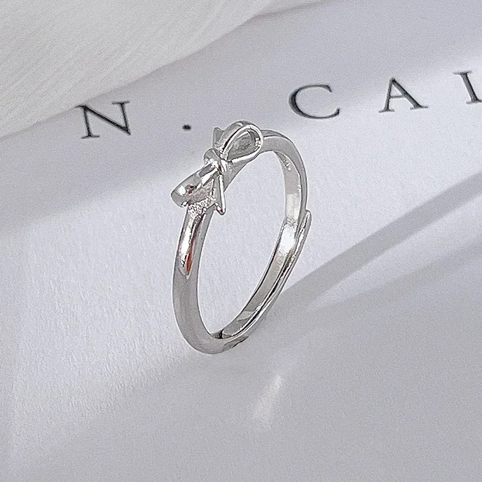 Real 925 Sterling Silver Minimalist Bowknot Adjustable Round Rings for Women Cute Fine Jewelry Accessories in Summer
Real 925 Sterling Silver Minimalist Bowknot Adjustable Round Rings for Women Cute Fine Jewelry Accessories in Summer