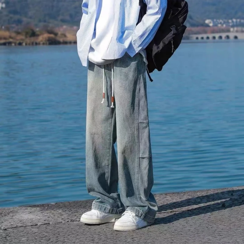 Мужские джинсы прямого кроя с эластичным поясом и эффектом потертости, свободные, повседневные, в американском стиле, для весны и осени
Мужские джинсы прямого кроя с эластичным поясом и эффектом потертости, свободные, повседневные, в американском стиле, для весны и осени