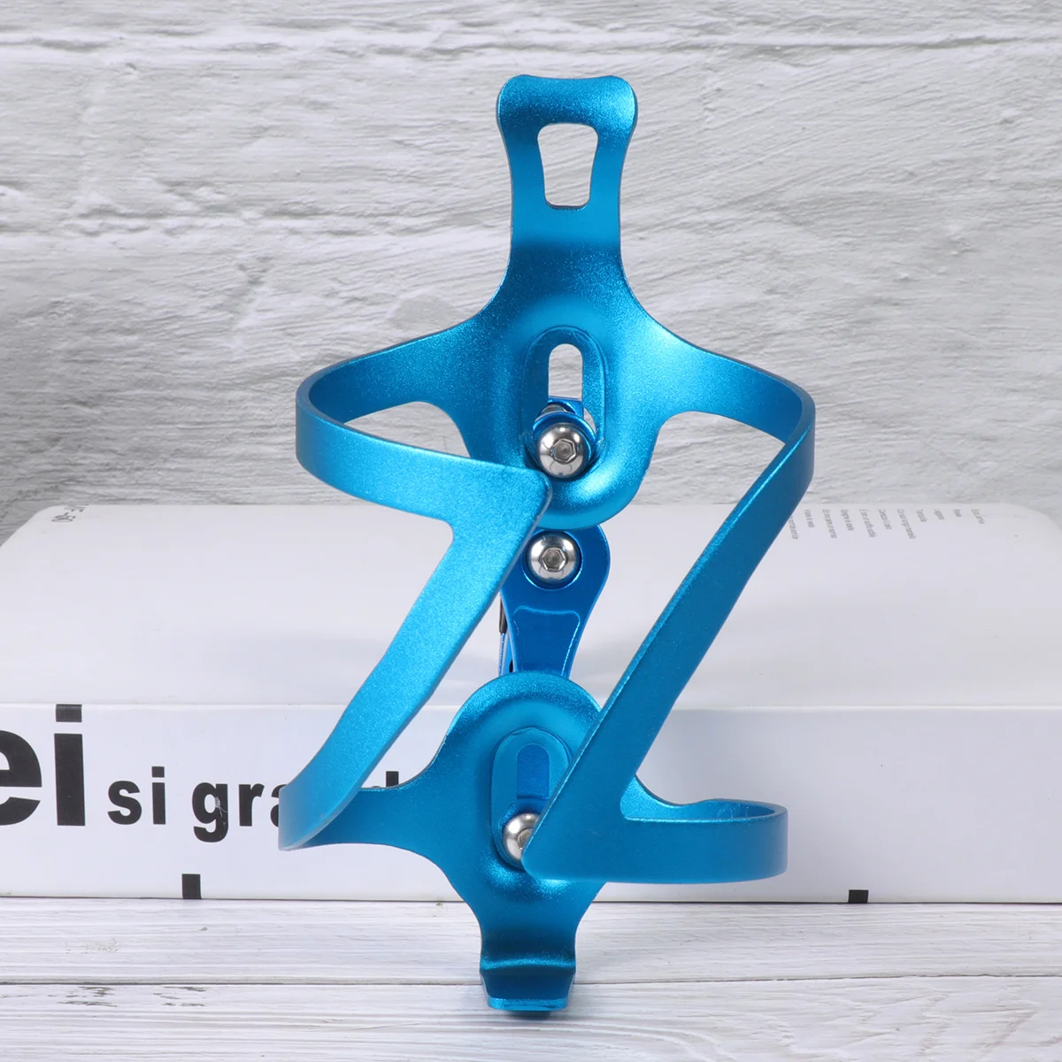 1Pcs Water Bottle Holder Aluminum Alloy Bike Bottle Rack Sturdy Lightweight Mount for Mountain Bicycle Cycling Riding Secure Fit
1Pcs Water Bottle Holder Aluminum Alloy Bike Bottle Rack Sturdy Lightweight Mount for Mountain Bicycle Cycling Riding Secure Fit