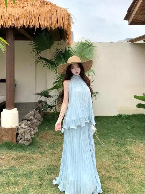Summer Vacation Gentle Wind Hanging Neck Vest Women's Loose Wide Skirt Draping Sensation Half-length Skirt Two-piece Set
Summer Vacation Gentle Wind Hanging Neck Vest Women's Loose Wide Skirt Draping Sensation Half-length Skirt Two-piece Set