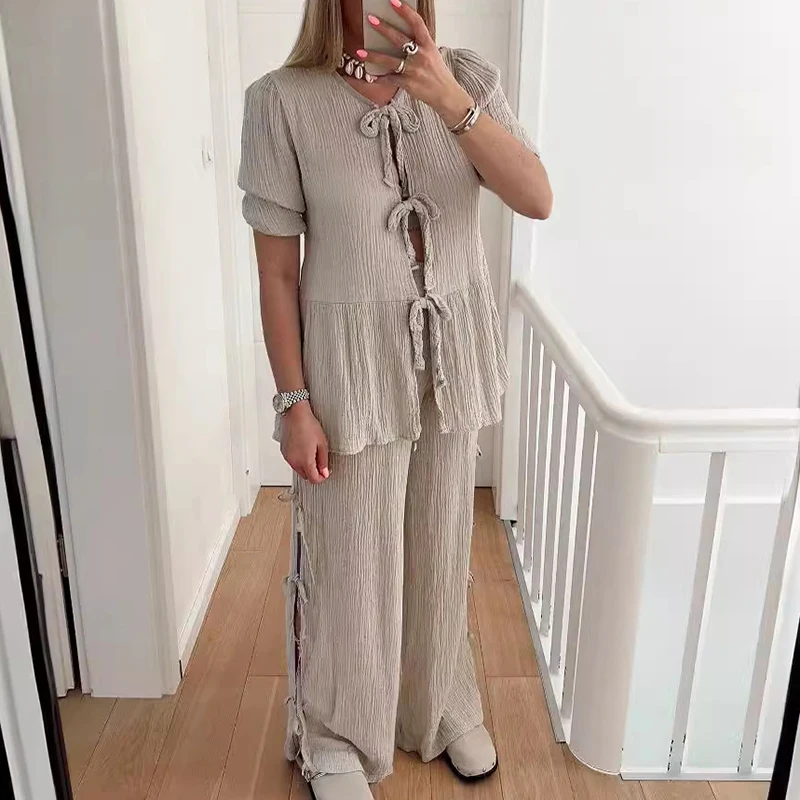 Fashion O-neck Tie Up Top with Long Pants Suit Casual Women's Summer Two Piece Set Simple Solid Color Short Sleeved Loose Outfit
Fashion O-neck Tie Up Top with Long Pants Suit Casual Women's Summer Two Piece Set Simple Solid Color Short Sleeved Loose Outfit