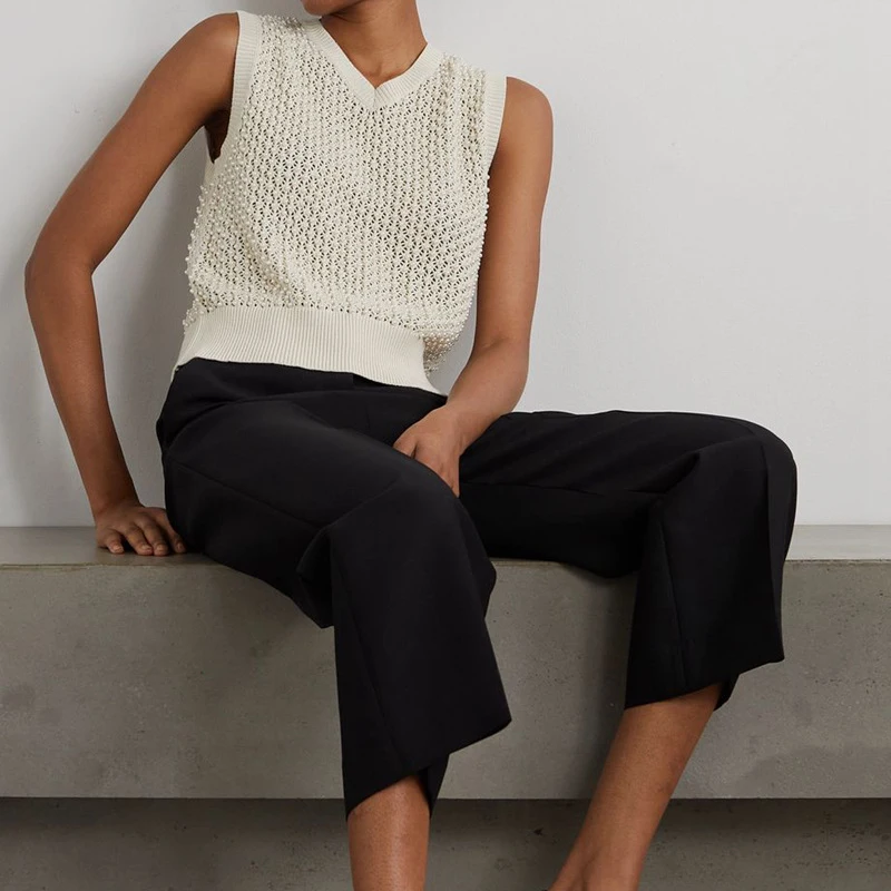 Classic loose V-neck pearl embellished fashion short knitted vest women commuting hundred with pullover tops 2023 spring new
Classic loose V-neck pearl embellished fashion short knitted vest women commuting hundred with pullover tops 2023 spring new