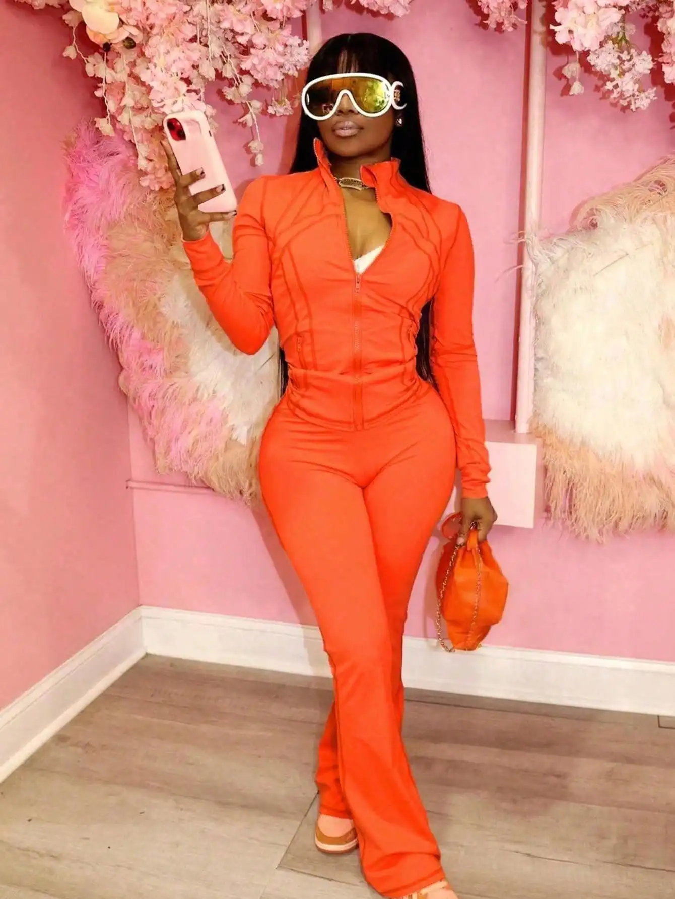 Женский оранжевый комбинезон на молнии с длинными рукавами для повседневной носки, офиса и активного отдыха - весна-осень
Женский оранжевый комбинезон на молнии с длинными рукавами для повседневной носки, офиса и активного отдыха - весна-осень