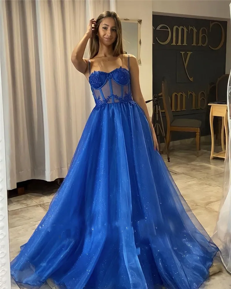 Sparkly Royal Blue Tulle Prom Dresses Sweetheart Lace Appliques Sexy Spaghetti Straps Evening Gowns Long Party Wear فستان سهرة
Sparkly Royal Blue Tulle Prom Dresses Sweetheart Lace Appliques Sexy Spaghetti Straps Evening Gowns Long Party Wear فستان سهرة
