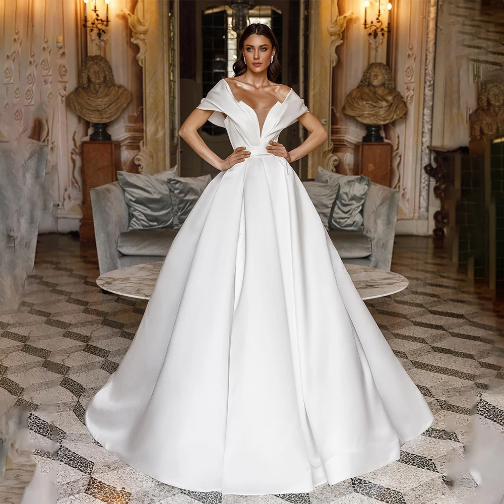 Elegant Off The Shoulder V-neck High Quality Satin Ball Grown Wedding Dresses Sweep Train Custom Made 2024 Vestido De Noival
Elegant Off The Shoulder V-neck High Quality Satin Ball Grown Wedding Dresses Sweep Train Custom Made 2024 Vestido De Noival