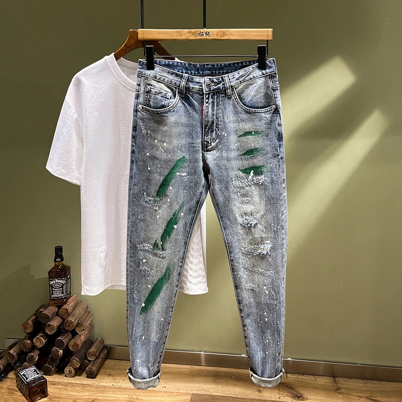 TC2892 Trendy jeans men's broken holes tide elastic Slim embroidery patches spray-painted small leg trousers
TC2892 Trendy jeans men's broken holes tide elastic Slim embroidery patches spray-painted small leg trousers