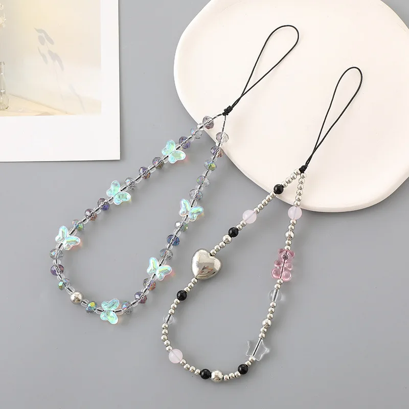 Новая цепочка для телефона с жемчужными бусинами в виде звезды, модная подвеска для iPhone Samsung, универсальные аксессуары, ремешок, подвесная веревка для девочки, кулон
Новая цепочка для телефона с жемчужными бусинами в виде звезды, модная подвеска для iPhone Samsung, универсальные аксессуары, ремешок, подвесная веревка для девочки, кулон