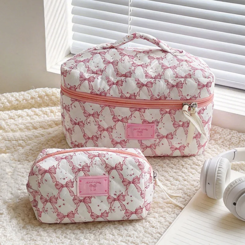 Korean pink bow cosmetic bag large capacity ins wind portable travel wash storage bag
Korean pink bow cosmetic bag large capacity ins wind portable travel wash storage bag