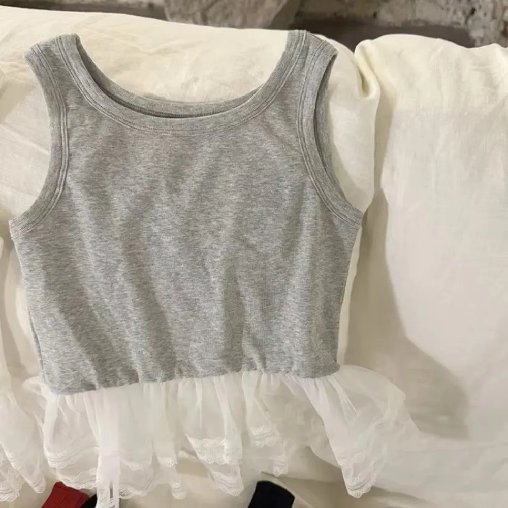 Fashion O-neck Sleeveless Tank Top Elastic Soft T-shirt Solid Color Lace Ear Edge Splicing Mesh Waistcoats Summer
Fashion O-neck Sleeveless Tank Top Elastic Soft T-shirt Solid Color Lace Ear Edge Splicing Mesh Waistcoats Summer