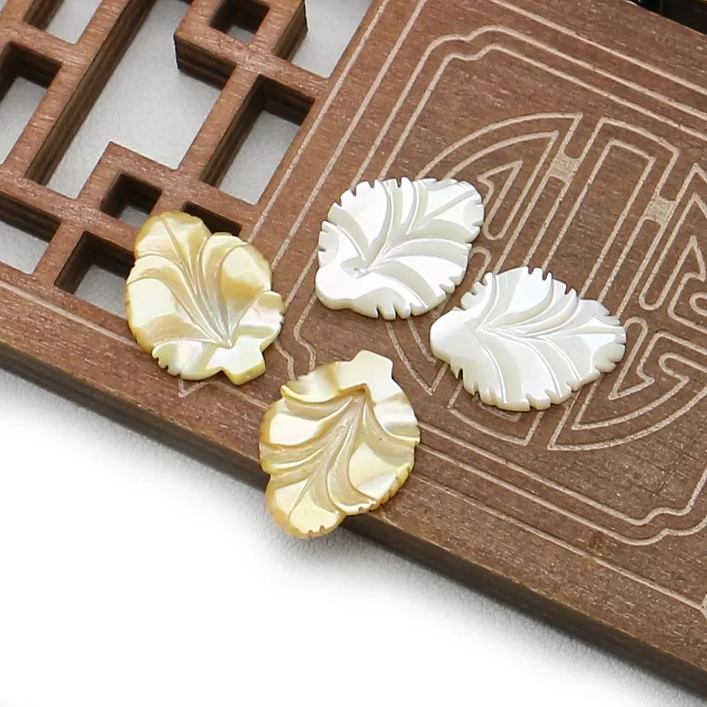 Minimalist Compact Natural Sea Yellow Shell Carved Leaf-shaped Straight-hole Loose Beads Handcraft Accessory Necklaces Jewelry
Minimalist Compact Natural Sea Yellow Shell Carved Leaf-shaped Straight-hole Loose Beads Handcraft Accessory Necklaces Jewelry