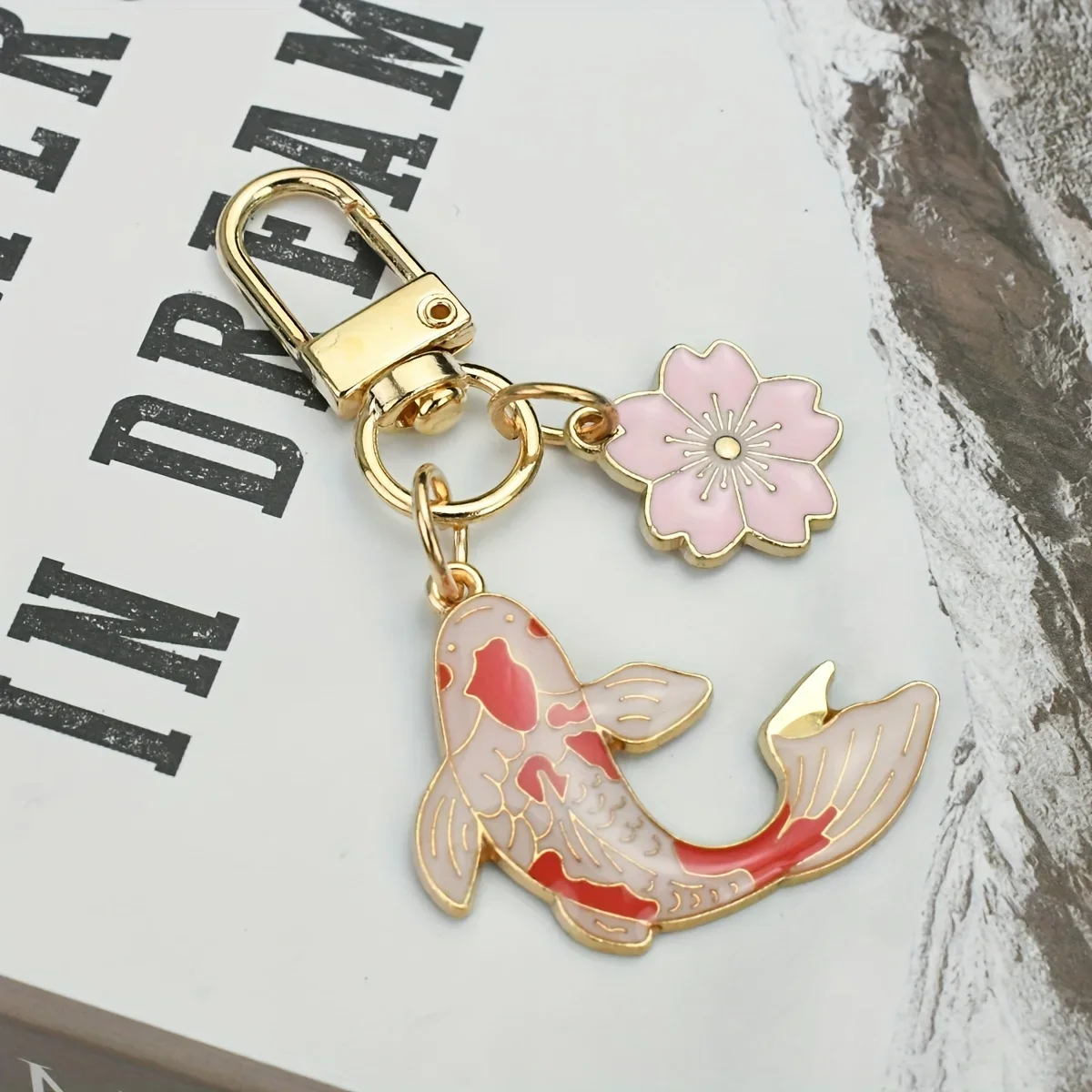 The Koi Fish Cherry Blossom Keychain Brings You Good Fortune! This Creatively Stylish Keychain Accessory Features a Lively Koi Fish, Making It a Fun Pendant Suitable for Everyone. It'S a Perfect Gift Pendant to Bless for family And Friends During Th
The Koi Fish Cherry Blossom Keychain Brings You Good Fortune! This Creatively Stylish Keychain Accessory Features a Lively Koi Fish, Making It a Fun Pendant Suitable for Everyone. It'S a Perfect Gift Pendant to Bless for family And Friends During Th