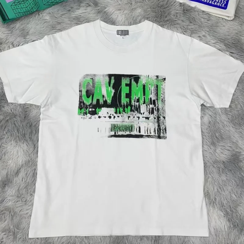Logo Letter Graffiti Print CAV EMPT C.E T-Shirt Men Women Oversized Short Sleeves Tee Cotton CAVEMPT T Shirt
Logo Letter Graffiti Print CAV EMPT C.E T-Shirt Men Women Oversized Short Sleeves Tee Cotton CAVEMPT T Shirt