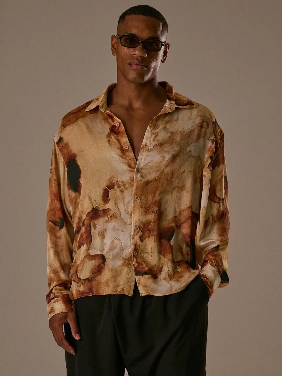 Men's Oversized Long Sleeve Button-Up Shirt with Abstract Print
Men's Oversized Long Sleeve Button-Up Shirt with Abstract Print