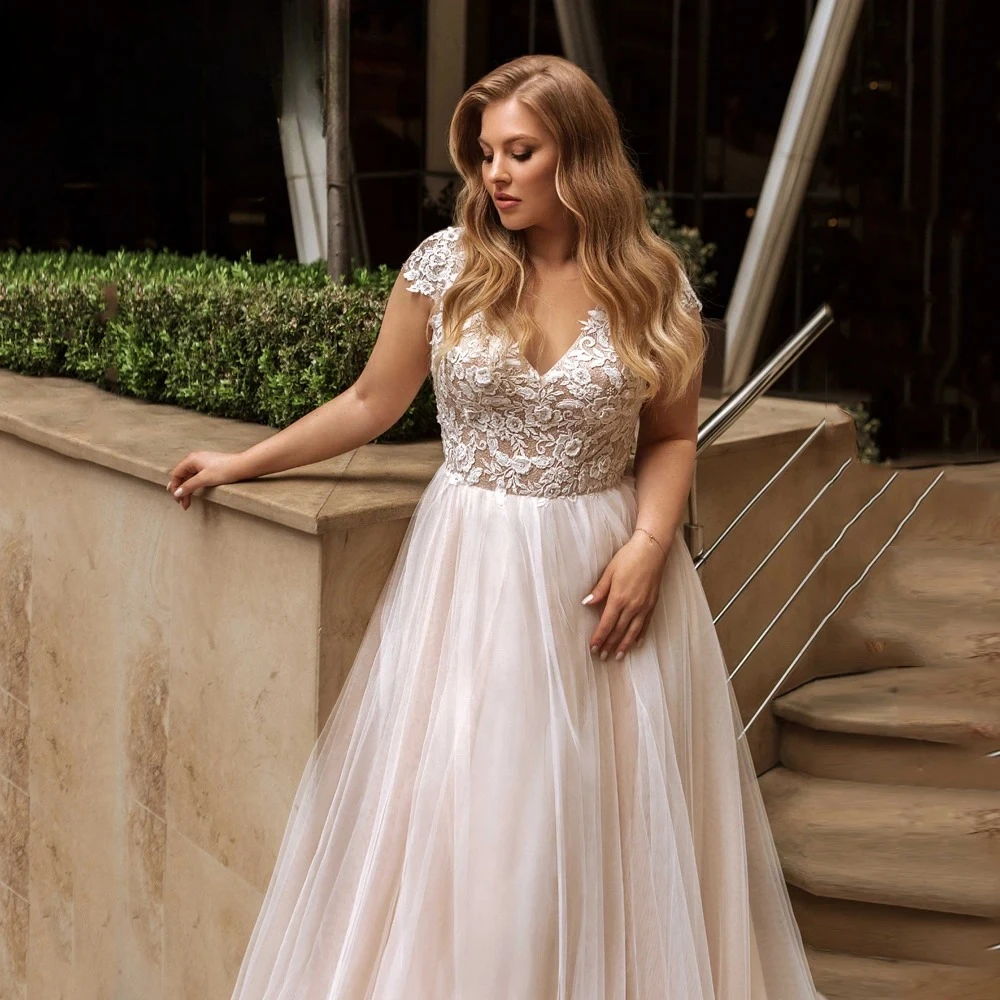 Classic Tulle Wedding Dresses Plus Size V Neck Cap Sleeves Bride Gowns Appliques Floor Length A-Line Vestidos De Novia
Classic Tulle Wedding Dresses Plus Size V Neck Cap Sleeves Bride Gowns Appliques Floor Length A-Line Vestidos De Novia