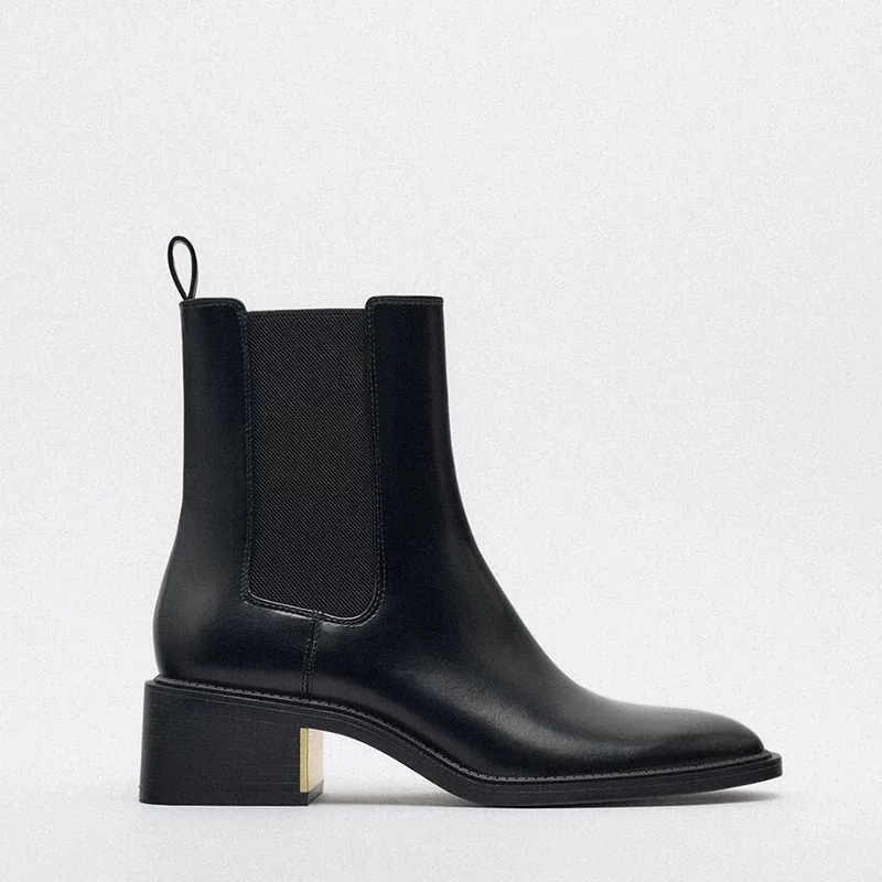 Женские черные кожаные ботинки челси с золотым акцентом на блочном каблуке, эластичные боковые вставки, гладкие, элегантные, идеальные для повседневного использования/офиса
Женские черные кожаные ботинки челси с золотым акцентом на блочном каблуке, эластичные боковые вставки, гладкие, элегантные, идеальные для повседневного использования/офиса