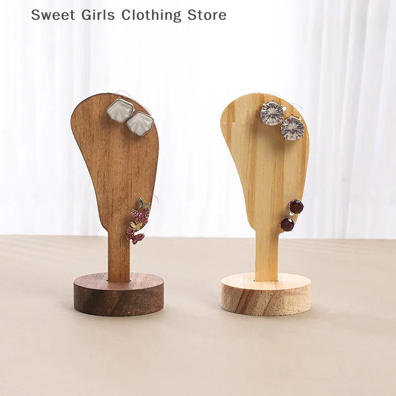 1pcs Wood Ear Shaped Jewelry Earring Holder Display Stand Fashion Ear-shaped Ear Clip Stud Suitable For Jewelry Earrings
1pcs Wood Ear Shaped Jewelry Earring Holder Display Stand Fashion Ear-shaped Ear Clip Stud Suitable For Jewelry Earrings