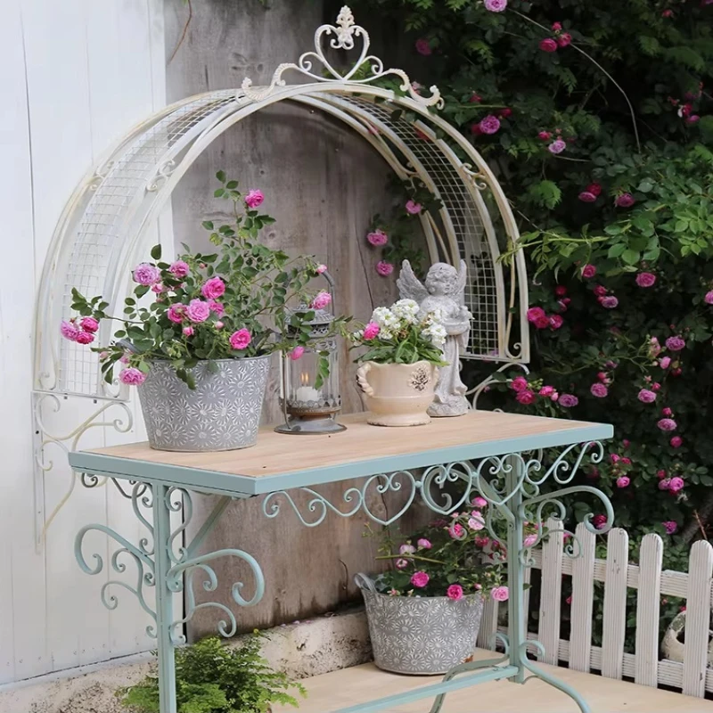 Vintage Iron Arch Trellis for Climbing Plants Rustic Wall Garden Shelf with Hanging Hooks for Balcony Patio Outdoor Decor
Vintage Iron Arch Trellis for Climbing Plants Rustic Wall Garden Shelf with Hanging Hooks for Balcony Patio Outdoor Decor