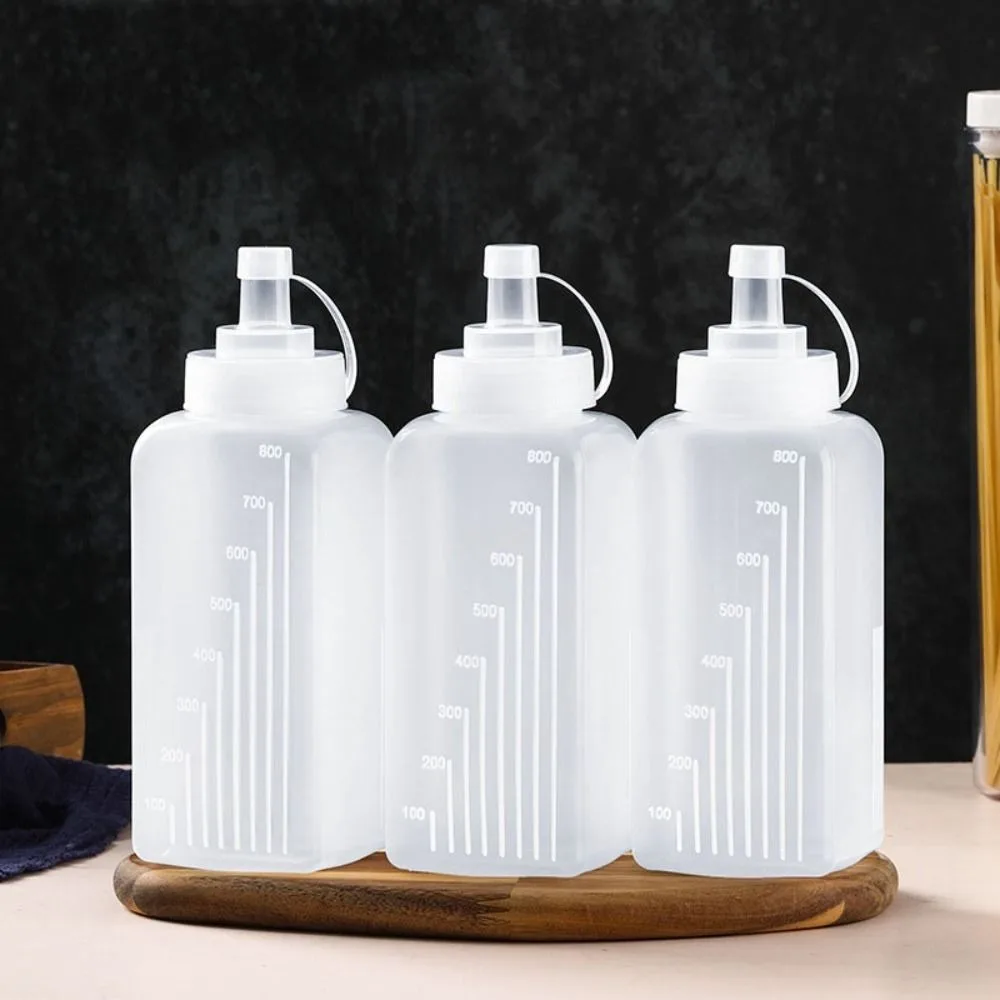 800ml Condiment Squeeze Bottles Transparent Plastic Sauce Bottles Square Prism with Scale Condiment Dispenser Salad
800ml Condiment Squeeze Bottles Transparent Plastic Sauce Bottles Square Prism with Scale Condiment Dispenser Salad