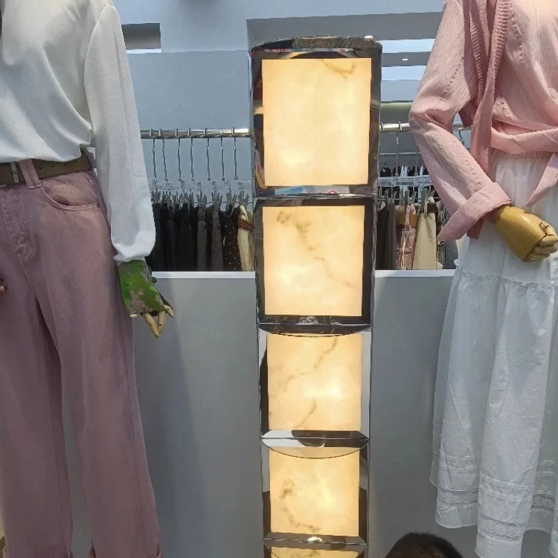 Rotating high-end luxury stainless steel decorative marble art floor lamp 
Rotating high-end luxury stainless steel decorative marble art floor lamp