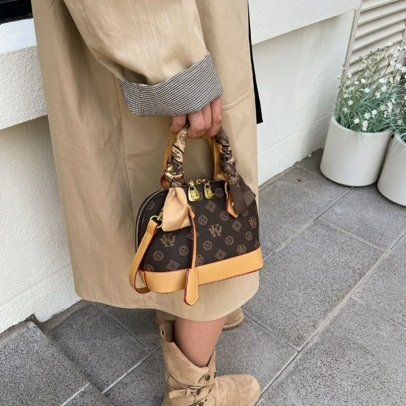 Женская модная сумка 2025 года, легкая роскошь, нишевая модель, высококачественная женская сумка-ракушка с контрастными цветами
Женская модная сумка 2025 года, легкая роскошь, нишевая модель, высококачественная женская сумка-ракушка с контрастными цветами