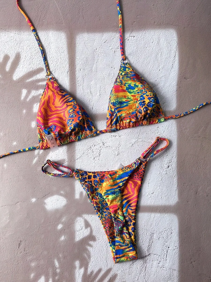 Multicolor All Over Print Halter Bikini Set With Tie Back Detail
Multicolor All Over Print Halter Bikini Set With Tie Back Detail