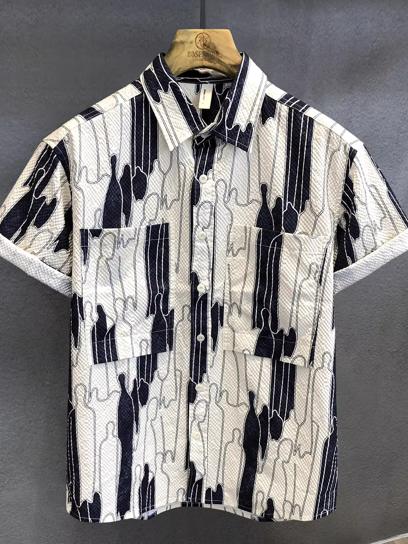 Loose Men's Short Sleeve Bubble Texture Graffiti Shirt Breathable Casual Summer Shirt Comfortable Polyester Fiber Regular Length
Loose Men's Short Sleeve Bubble Texture Graffiti Shirt Breathable Casual Summer Shirt Comfortable Polyester Fiber Regular Length