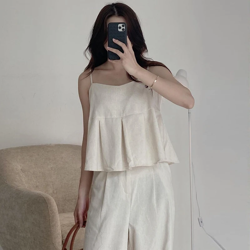 Chic Summer Simple Square Collar Color Strap Vest High Waist Wide Leg Casual Pants Set Fashionable French Style Ensemble
Chic Summer Simple Square Collar Color Strap Vest High Waist Wide Leg Casual Pants Set Fashionable French Style Ensemble