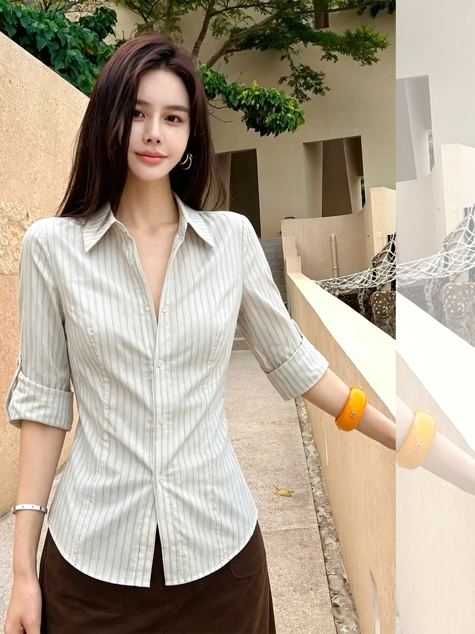 Slim Fit Striped Shirt Women's mid Sleeve Layering Inner Wear Waist Cinched Top Korean Style Commute Fashion Summer 2026
Slim Fit Striped Shirt Women's mid Sleeve Layering Inner Wear Waist Cinched Top Korean Style Commute Fashion Summer 2026