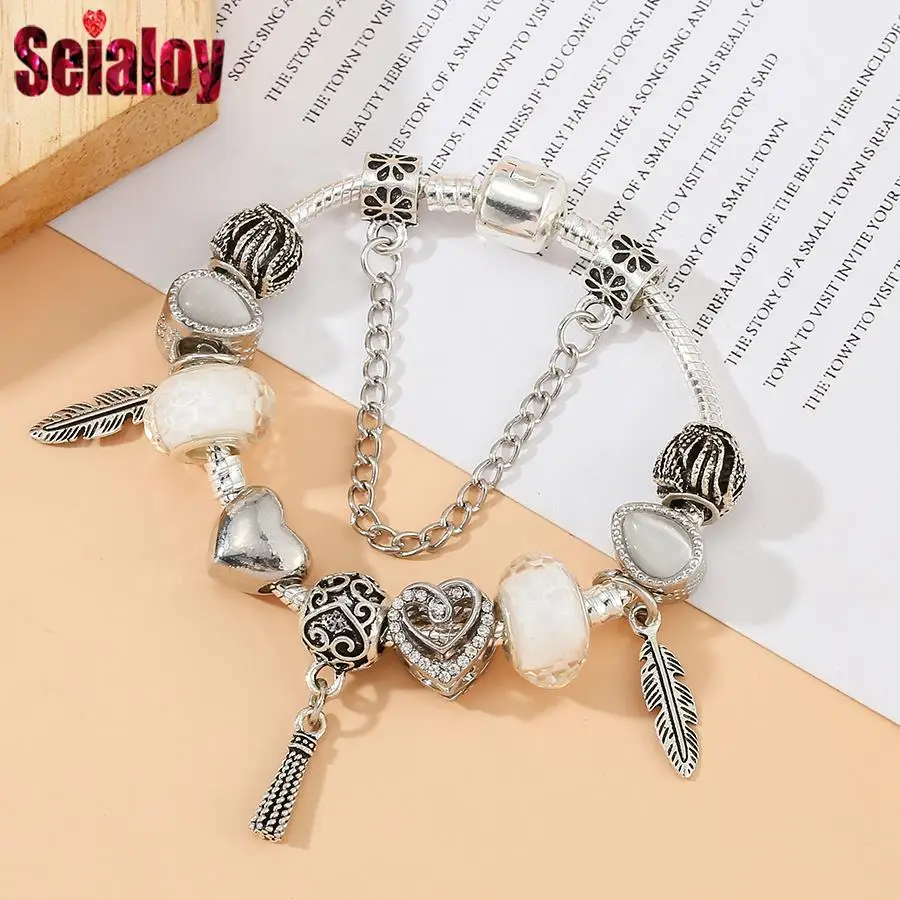Seialoy Fantasy Feather Charm Bracelets For Women Men Original Heart Water Drop Crystal Beaded Silver Color Bangle Jewelry
Seialoy Fantasy Feather Charm Bracelets For Women Men Original Heart Water Drop Crystal Beaded Silver Color Bangle Jewelry