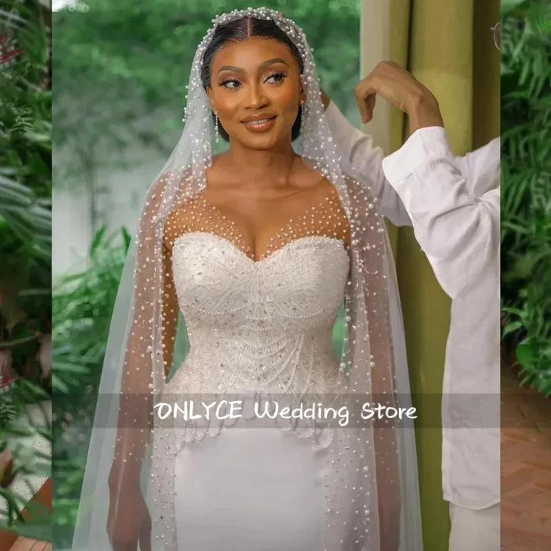 Customized Luxury Mermaid Pearl Wedding Dresses For African Beaded O-Neck Sequined Bride Dresses Illusion Sleeves Corset
Customized Luxury Mermaid Pearl Wedding Dresses For African Beaded O-Neck Sequined Bride Dresses Illusion Sleeves Corset