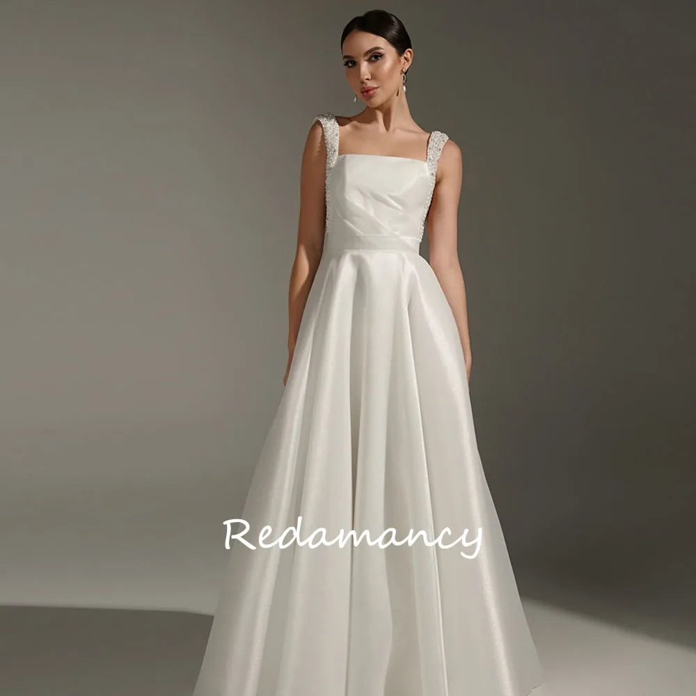 Redamancy Customized Ivory Strapless Satin Wedding Dress 2025 Beading Spaghetti Strap A-Line Bridal Gowns vestidos de novia
Redamancy Customized Ivory Strapless Satin Wedding Dress 2025 Beading Spaghetti Strap A-Line Bridal Gowns vestidos de novia