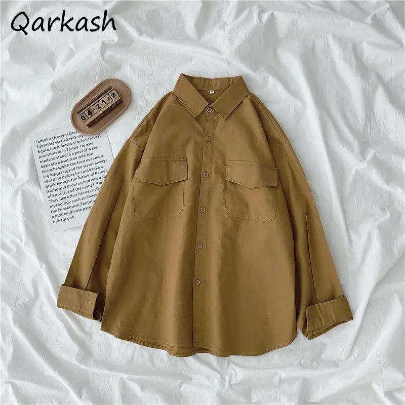 Рубашки с длинным рукавом, женские свободные однотонные карманы, топы больших размеров 3XL, однобортные, новые, простые, в корейском стиле, повседневная уличная одежда, шикарная одежда
Рубашки с длинным рукавом, женские свободные однотонные карманы, топы больших размеров 3XL, однобортные, новые, простые, в корейском стиле, повседневная уличная одежда, шикарная одежда