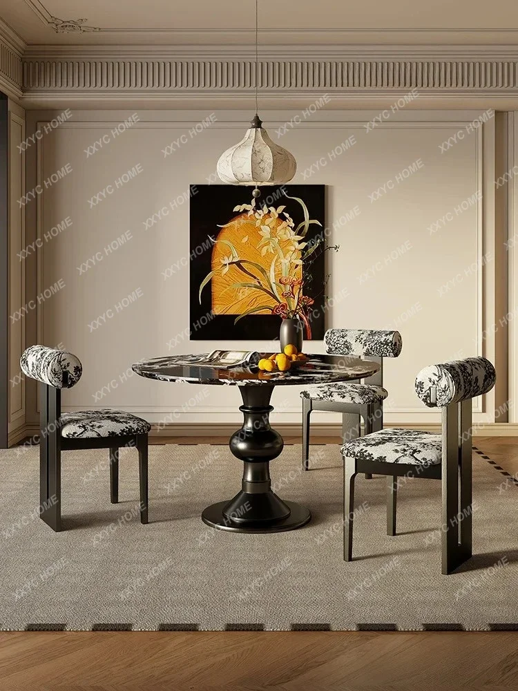 black natural luxury stone marble dining table and chairs high-end household solid wood round table combination
black natural luxury stone marble dining table and chairs high-end household solid wood round table combination