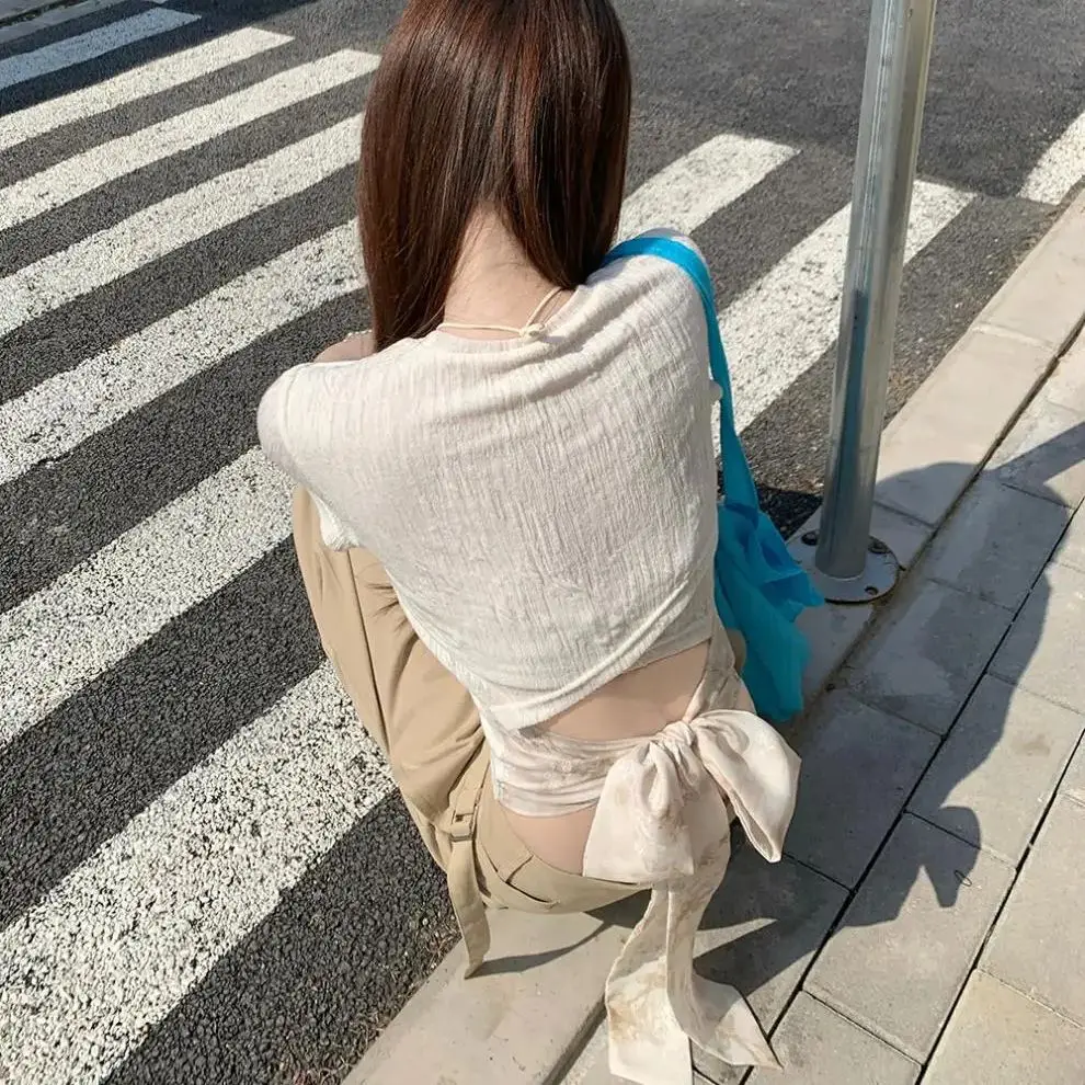 2025 new spicy girl back hollow bow strap solid color short sleeved T-shirt women's top
2025 new spicy girl back hollow bow strap solid color short sleeved T-shirt women's top