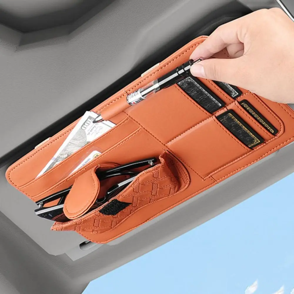 Многофункциональный органайзер для автомобильного козырька, износостойкий держатель для солнцезащитных очков зоновая конструкция, экономия места, держатель для автомобильных билетов из искусственной кожи, ручка 
Многофункциональный органайзер для автомобильного козырька, износостойкий держатель для солнцезащитных очков зоновая конструкция, экономия места, держатель для автомобильных билетов из искусственной кожи, ручка