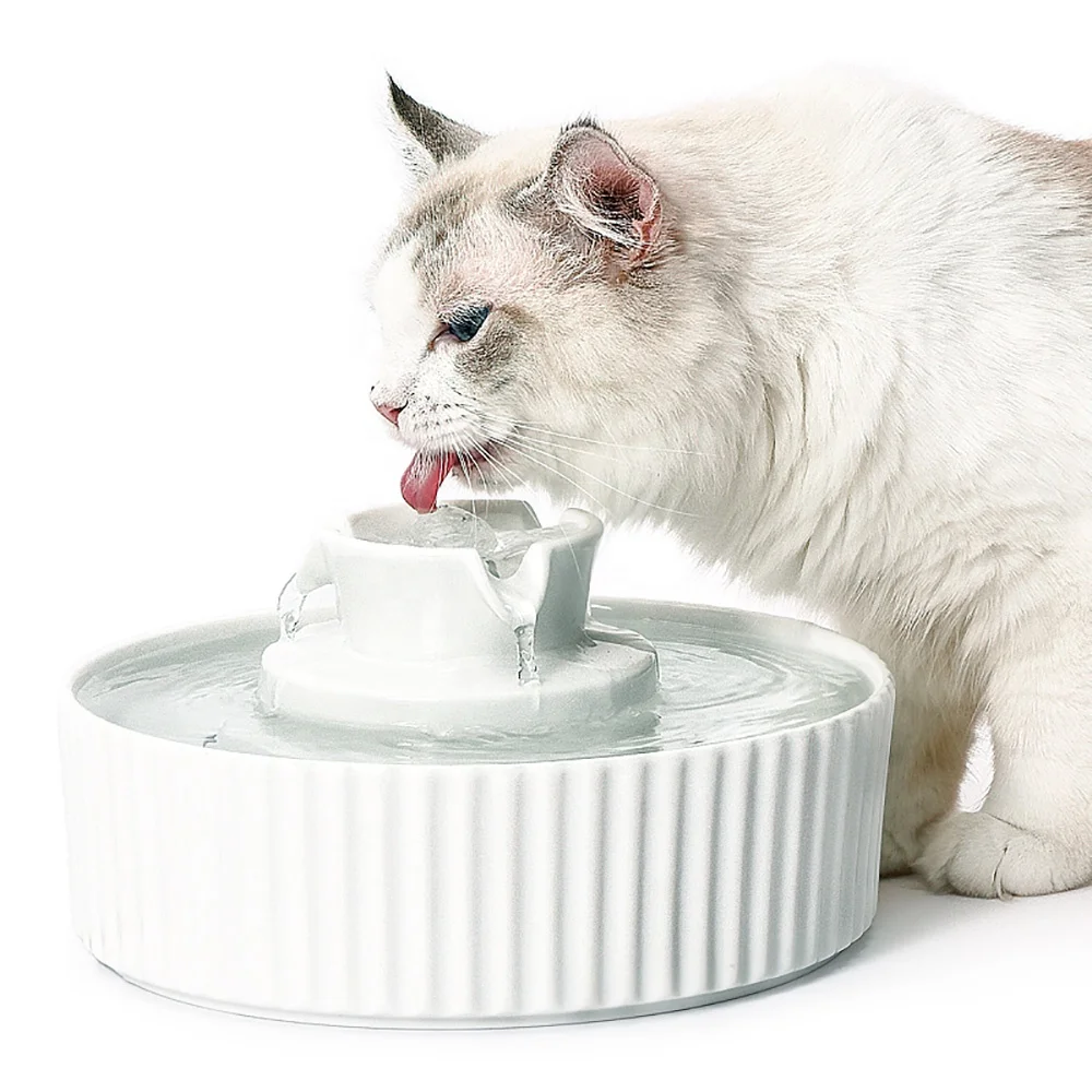 2020 Cake Shape Pet Smart Water Dispenser 2.1L Ceramic Water Bowl Pet Drinking Fountain 
2020 Cake Shape Pet Smart Water Dispenser 2.1L Ceramic Water Bowl Pet Drinking Fountain