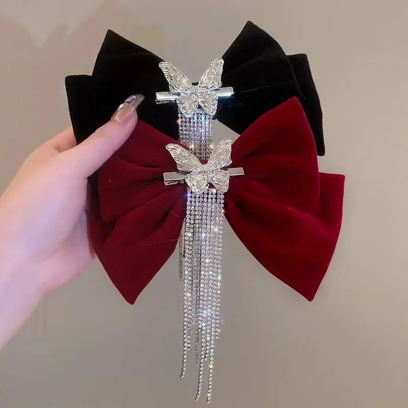 Korean version velvet bow with diamond tassel spring clip hairpin back head top clip hairpin girl headdress
Korean version velvet bow with diamond tassel spring clip hairpin back head top clip hairpin girl headdress