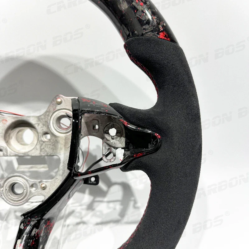 Suitable Red forged carbon fiber suede steering wheel Elantra i20 and i30
Suitable Red forged carbon fiber suede steering wheel Elantra i20 and i30