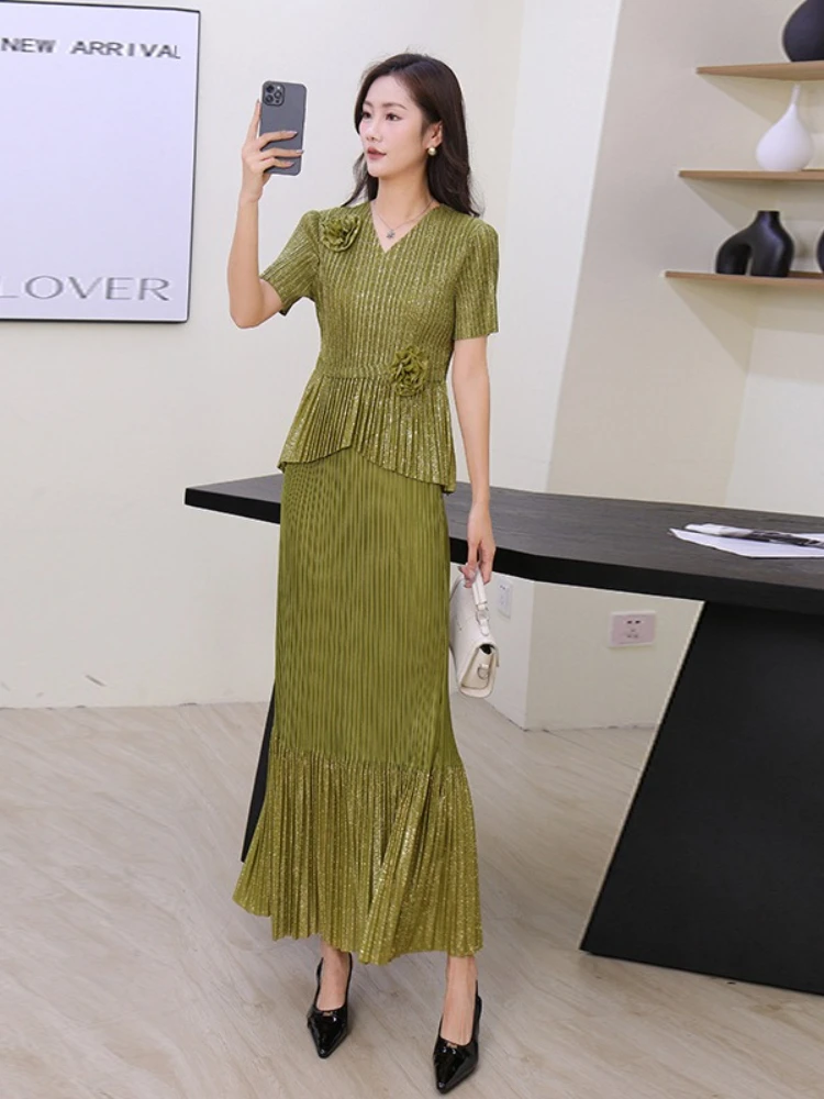 Miyake 2025 летние новые темпераментные модные женские комплекты из двух предметов с v-образным вырезом и цветочным дизайном, топ, длинная юбка, плиссированный комплект
Miyake 2025 летние новые темпераментные модные женские комплекты из двух предметов с v-образным вырезом и цветочным дизайном, топ, длинная юбка, плиссированный комплект