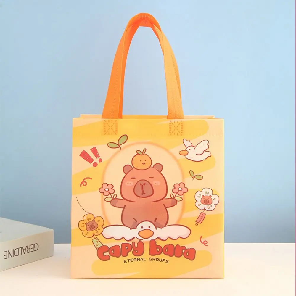 Durable Cartoon Capybara Tote Bag Foldable Non-Woven Fabrics Candy Gift Bags Portable Shopping Bag
Durable Cartoon Capybara Tote Bag Foldable Non-Woven Fabrics Candy Gift Bags Portable Shopping Bag