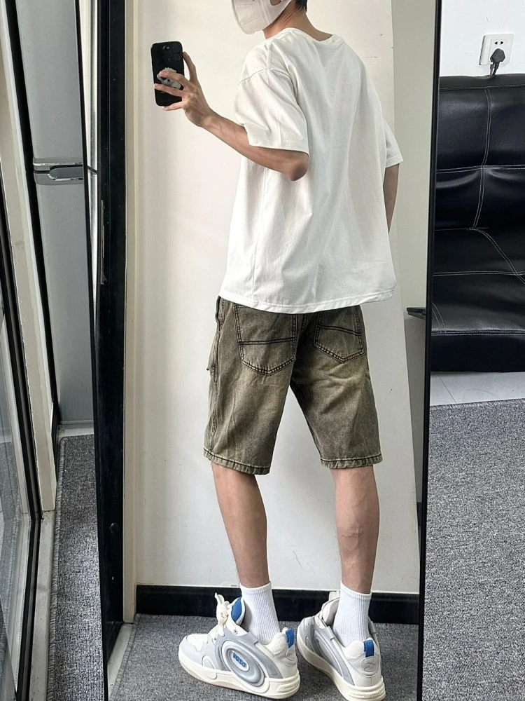 Versatile Men's Casual Denim Shorts Featuring Mud Dye and Ripped Design American Retro for Loose Fit Summer
Versatile Men's Casual Denim Shorts Featuring Mud Dye and Ripped Design American Retro for Loose Fit Summer