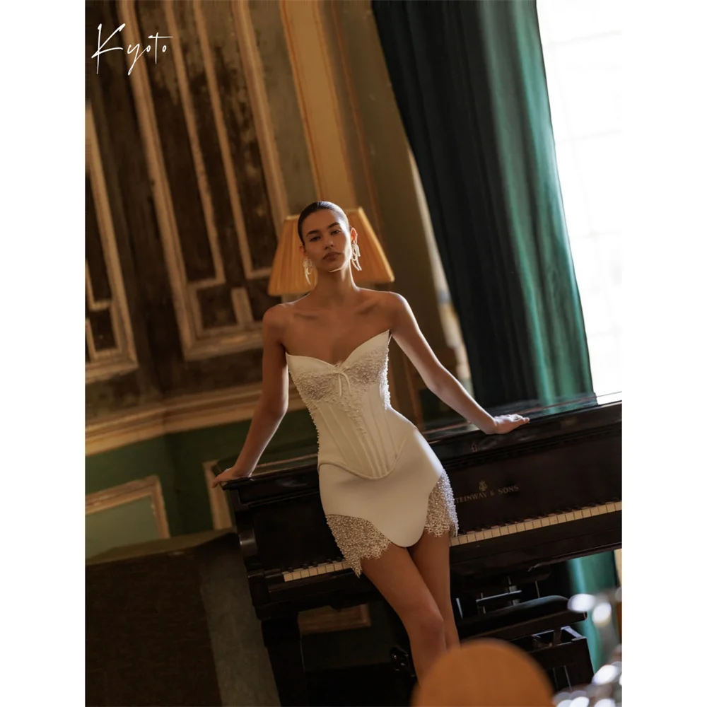 Kyoto Customized Lace Appliques Mini Sheath Wedding Dresses Strapless Sleeveless vestidos de novia Pleats Bow Evening Dresses
Kyoto Customized Lace Appliques Mini Sheath Wedding Dresses Strapless Sleeveless vestidos de novia Pleats Bow Evening Dresses