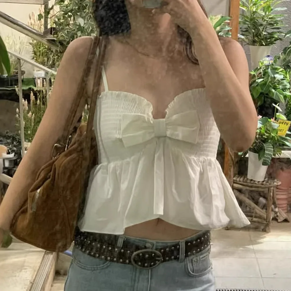 French bow tube top suspender vest women's 2026 new sweet girl gentle wind short ruffle edge sleeveless top
French bow tube top suspender vest women's 2026 new sweet girl gentle wind short ruffle edge sleeveless top